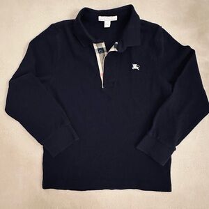 Burberry boys navy polo shirt with signature print accents - size 8